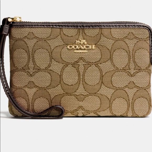 COACH Handbags - COACH CORNER ZIP WRISTLET IN SIGNATURE CANVAS